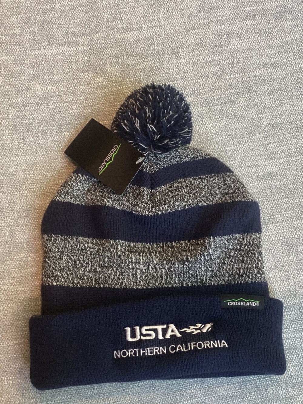 Brand new USTA striped beanie